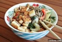 Creamy Peanut Noodles and Crispy Sesame Tofu Bowl