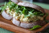 Tangy Chickpea Avocado Smash Sandwich with Feta and Arugula