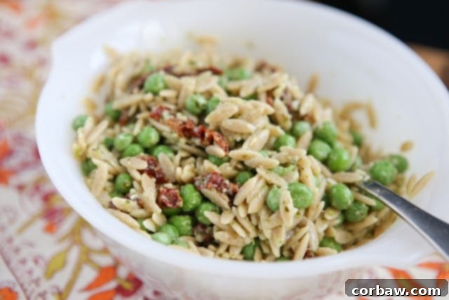 Wholesome Pesto Orzo with Peas 3 Whole Wheat Orzo with Pesto and Peas - Closeup Dish Image