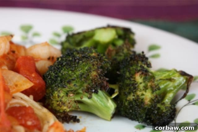 Perfectly roasted broccoli florets with crispy edges, ready to be served. A healthy and delicious side dish that kids love.