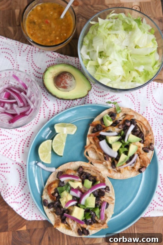 Slow Cooker Salsa Verde Pork Tostadas - a delicious, healthy baked tostada dinner with minimal ingredients, perfect for busy families.