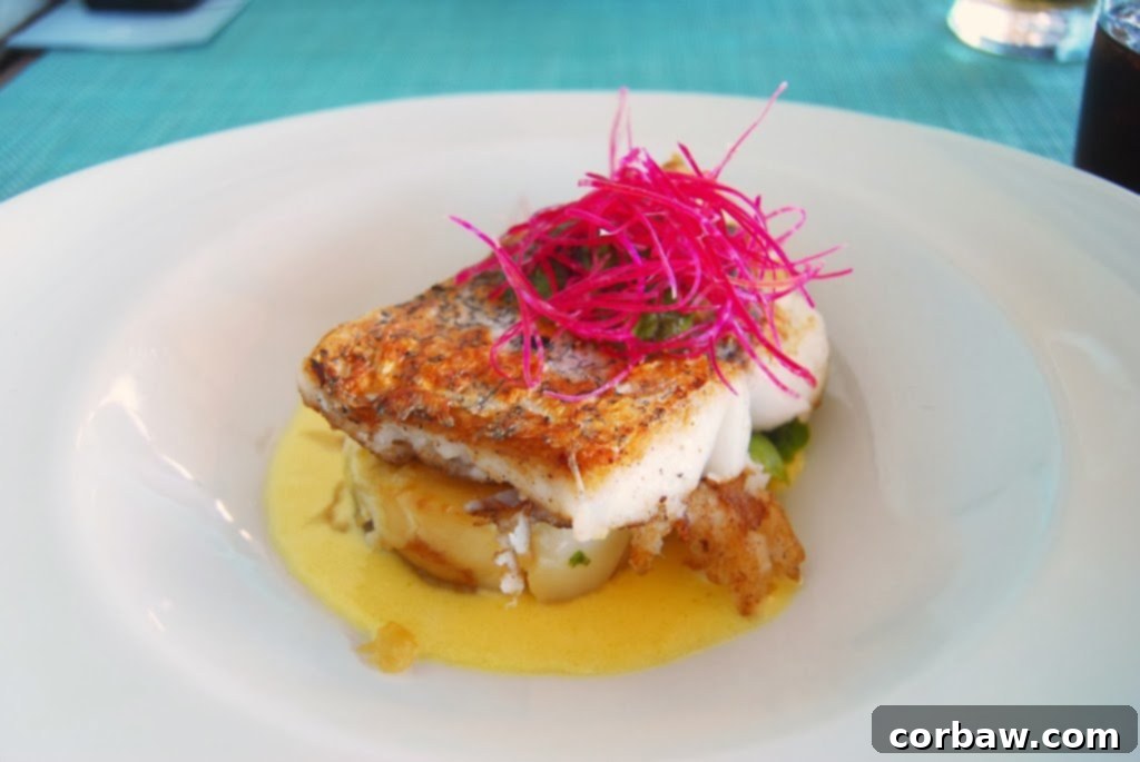 A plate of hake with salsa verde and lemony potatoes at Two Oceans Restaurant, Cape of Good Hope.