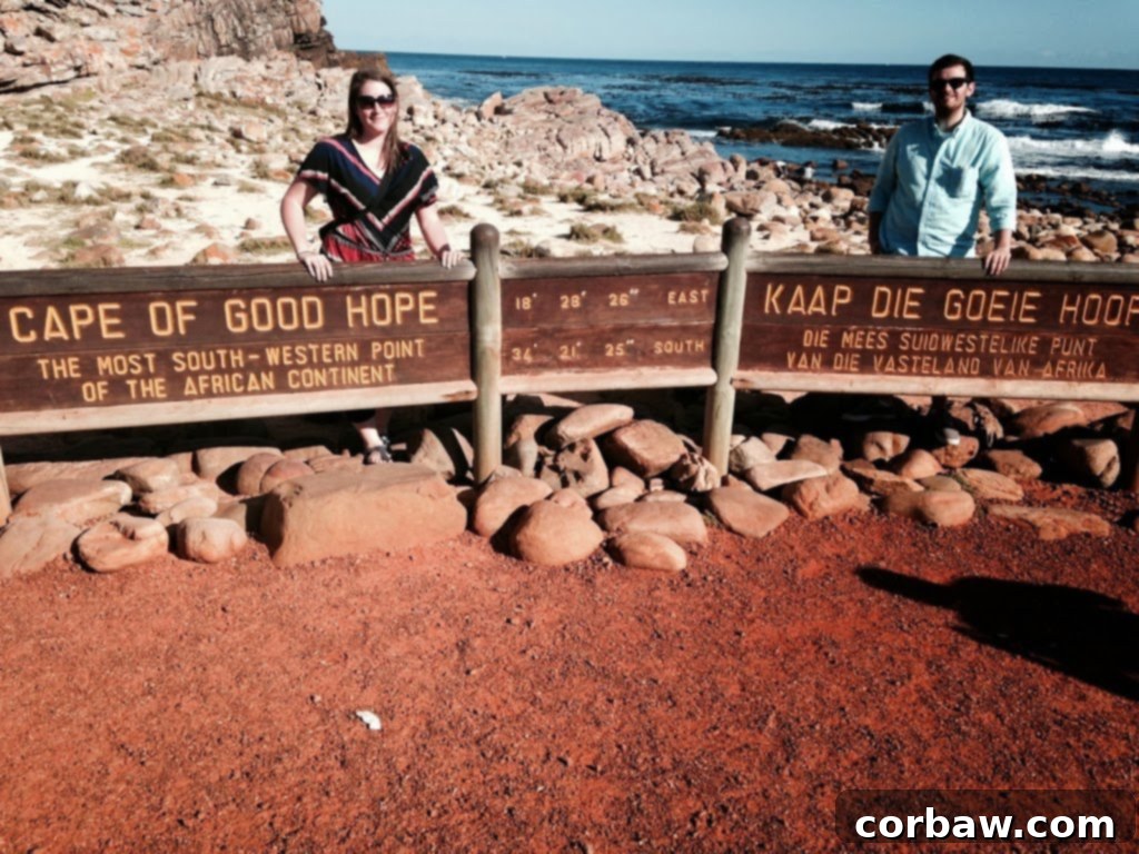 Taking a commemorative photo at the iconic Cape of Good Hope sign in South Africa.