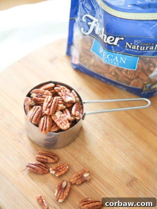 All the vibrant flavors of fall are beautifully presented on a plate: roasted sweet potatoes, Brussels sprouts, and pecans, generously drizzled with a maple, balsamic, and sriracha glaze. A perfect #ThinkFisher side dish.