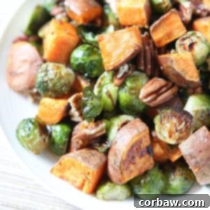 Roasted Sweet Potatoes and Brussels Sprouts with Pecans: a perfect fall and holiday side dish.