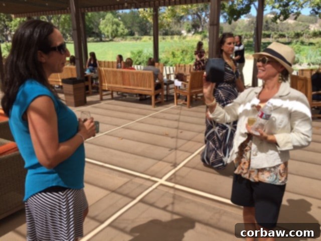 Cat Cora A close-up portrait of celebrity chef Cat Cora smiling warmly, highlighting her engaging personality.