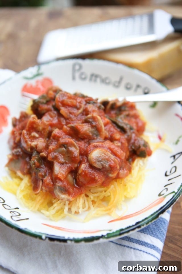 Spaghetti Squash with Sausage and Mushroom Bolognese This Spaghetti Squash with Sausage and Mushroom Bolognese is a hearty low carb meal full of flavor! One of my favorites.