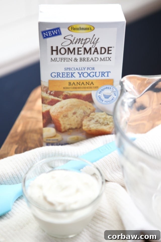 Freshly baked Cinnamon Banana Nut Muffins cooling on a rack, highlighting their perfect golden tops and irresistible appeal.