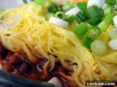 ChiliFallon - Turkey Taco Chili served over spaghetti squash, offering a lighter yet flavorful meal.