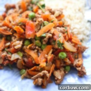 Filled with warm spices and veggies, this Kheema (Spiced Turkey and Peas) recipe is great served over rice or scooped up with pita or naan bread.