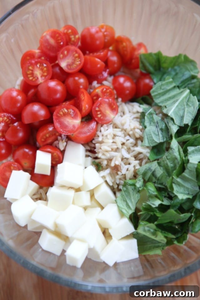 This Caprese Rice Salad recipe is bursting with fresh flavors! Great side dish for grilled meats or double the recipe to take to a barbecue or picnic. 