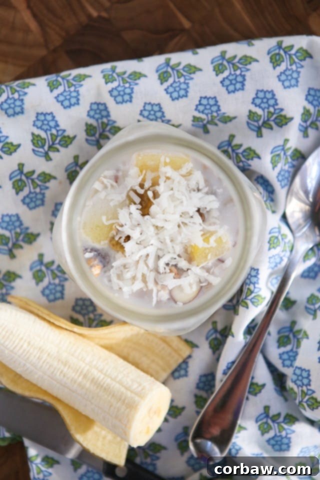 Tropical Overnight Oats Recipe: a combination of muesli, pineapple, golden raisins, coconut and almonds...this is the kind of breakfast you can't wait to wake up to!