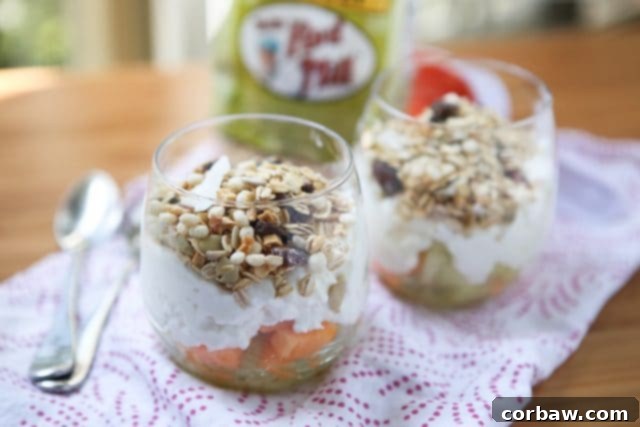 Sun-Kissed Melon Protein Parfait 3 Overhead shot of a delicious Summer Melon Protein Parfait, showcasing the simple yet satisfying three-ingredient combination of melon, cottage cheese, and Bob's Red Mill Gluten-Free Muesli.