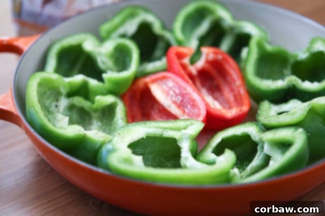 Veggie Enchilada Stuffed Peppers 6 The vibrant and aromatic filling mixture for the Vegetarian Enchilada Stuffed Peppers, showcasing a blend of quinoa, black beans, cheese, and various spices, ready for stuffing.