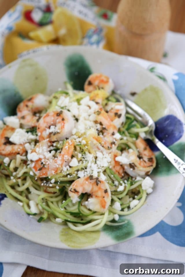 Delicious Zoodles with Shrimp and Feta A beautifully plated bowl of Skinnytaste Zoodles with Shrimp and Feta, ready to be served, highlighting the fresh ingredients.