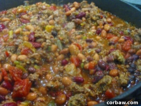 bushs beans Close-up of a rustic kitchen table with ingredients for cooking, possibly including beans, capturing a cozy home atmosphere.