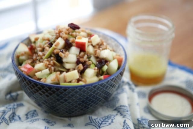 Harvest Farro Salad served in a white bowl, ready to be enjoyed as a healthy and colorful meal.