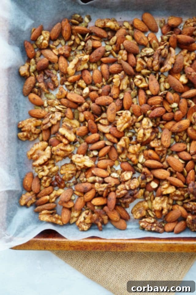 Assorted DIY healthy holiday food gifts, including jars of nuts and cookies, with festive decorations