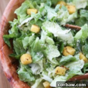Escarole Caesar Salad with Parmesan Walnut Vinaigrette and Polenta Croutons - a delicious twist on caesar salad! Recipe via aggieskitchen.com #thinkfisher