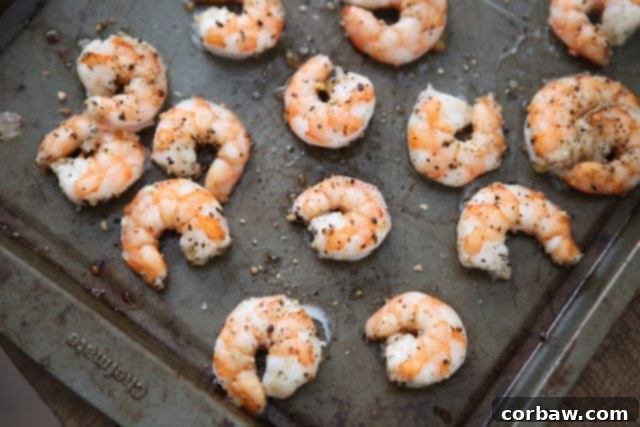 cooked shrimp on a baking sheet