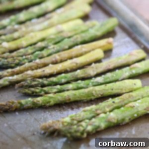 Roasted Asparagus is an easy way to get this spring vegetable favorite on the table at dinner time. Seasoned simply with just olive oil, salt and pepper and roasted to perfection.
