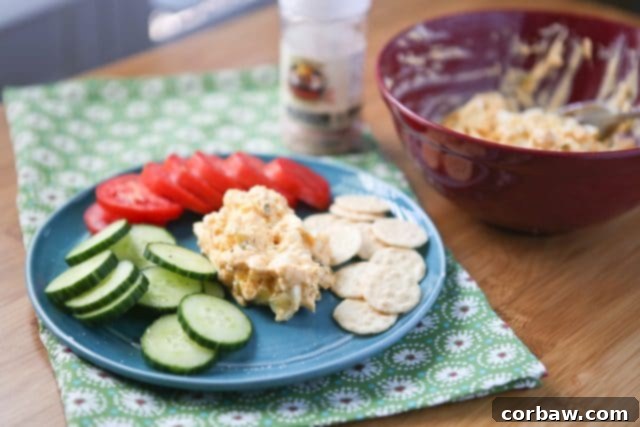 Creamy Greek Yogurt Egg Salad kicked up with smoked paprika - serve with bread, crackers or veggies for a healthy lunch or snack. Recipe via aggieskitchen.com