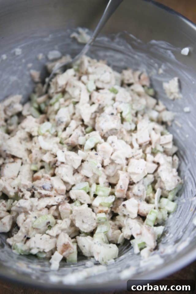 Grilled Lemon Pepper Chicken Salad with Greek Yogurt bowl of chicken, sweet onions, celery, seasonings, and mayonnaise mixed together