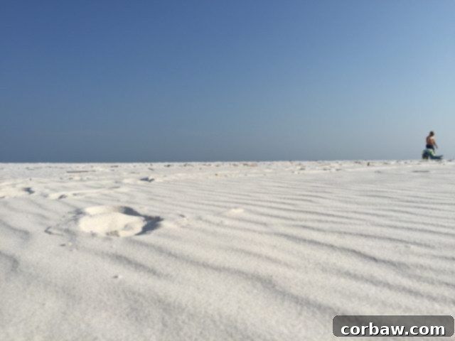 Perfect family moments on the beautiful beaches of 30A and Seaside, Florida Kids playing happily on the soft, white sand of a 30A beach, under clear blue skies