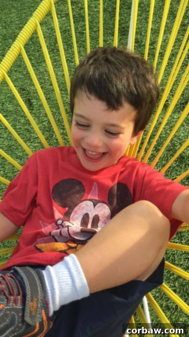 Happy moments for kids at The Hub 30A, with fun activities and great food A child enthusiastically enjoying the vibrant atmosphere at The Hub 30A