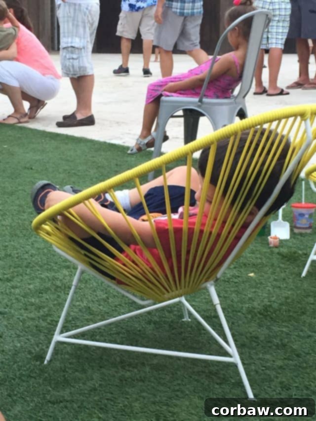 Relaxing after a day of adventure and entertainment at The Hub 30A Two children sleeping soundly, likely after a long day of fun at The Hub 30A