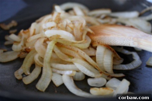 A selection of Smoky BBQ Turkey Burger Sliders with toppings, ready to be enjoyed.