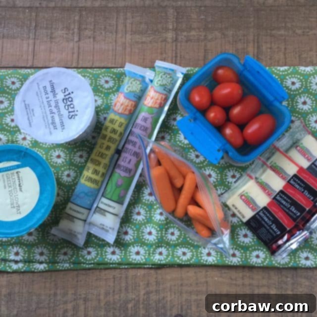 Tips for packing better lunches for your kids to take to school. Various healthy snacks prepared for school lunches, including fruits and vegetables for kids