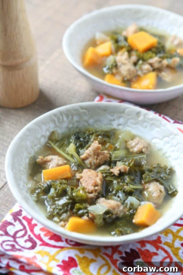 Slow Cooker Italian Sausage and Kale Soup 2 bowls of sausage kale soup and pepper mill