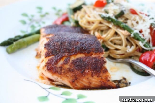 Sweet Heat Broiled Salmon 3 Beautifully cooked broiled salmon with sweet and spicy rub on a plate, ready to be served