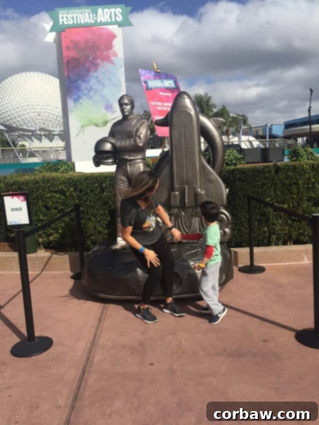 Epcot's Global Canvas 2018 12 Living Statue interacting with guests
