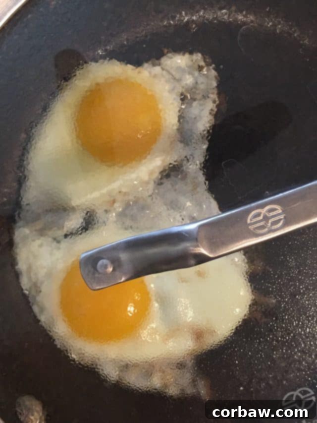 Enhance your Spinach and Egg Breakfast Toast with the popular Everything But The Bagel seasoning for a delightful crunch and savory taste. Top your healthy breakfast toast with Trader Joe's Everything But The Bagel seasoning for an extra burst of flavor, or simply use salt and pepper.