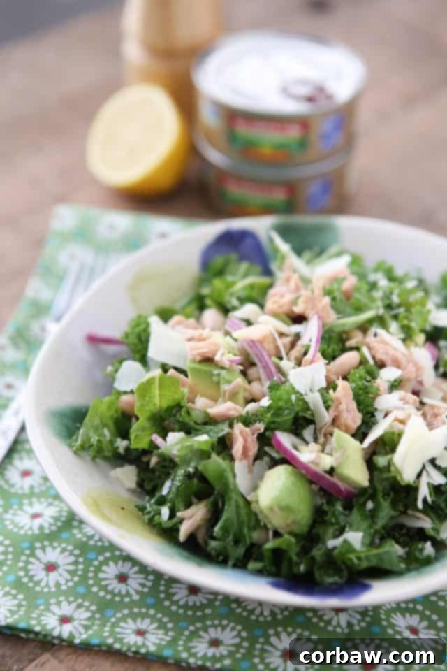 A vibrant and fresh Lemony Tuna and White Bean Kale Salad with Avocado, packed with protein and nutrients, perfect for a healthy meal. #tuna #kale #salad #avocado #healthyrecipe