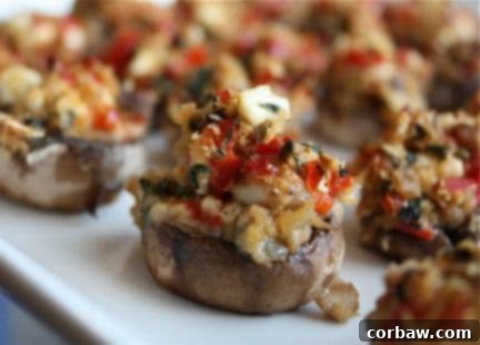 Gourmet Mediterranean Stuffed Mushrooms arranged on a small plate