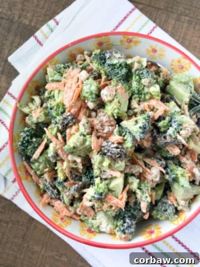 A vibrant and refreshing broccoli raisin salad with crunchy walnuts, perfect for summer entertaining and healthy potlucks. Features fresh broccoli, sweet raisins, and wholesome Fisher Nuts.