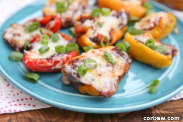 Touchdown Treats: Healthy Super Bowl Appetizers 7 Mini Mexican Stuffed Peppers - baby bell peppers stuffed with black refried beans, salsa and cheese. Hard to resist!