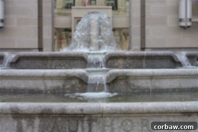 The grand dome of a historic D.C. landmark, possibly the U.S. Capitol Building, against a blue sky