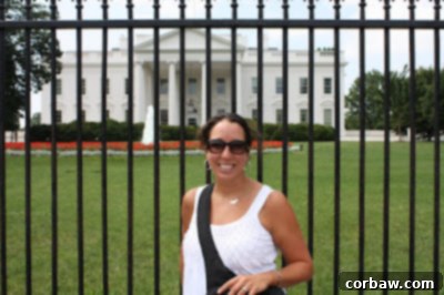 The iconic Washington Monument standing tall against a bright blue sky, a landmark of D.C.