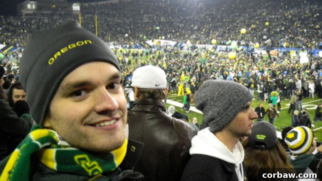 Boyfriend eagerly awaiting to rush the field with other fans