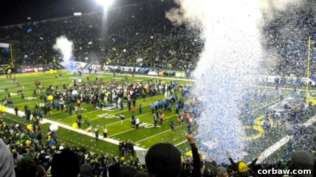 The Oregon Ducks players celebrating their championship victory on the field