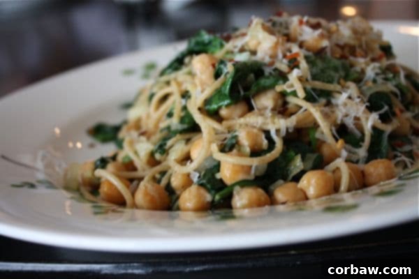 A bowl of delicious Whole Wheat Spaghetti with Chickpeas and Spinach, perfectly seasoned.
