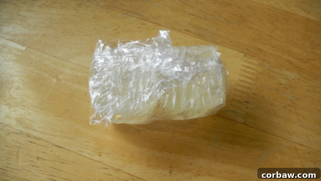 Frozen wine cubes stored in a freezer-safe bag, labeled
