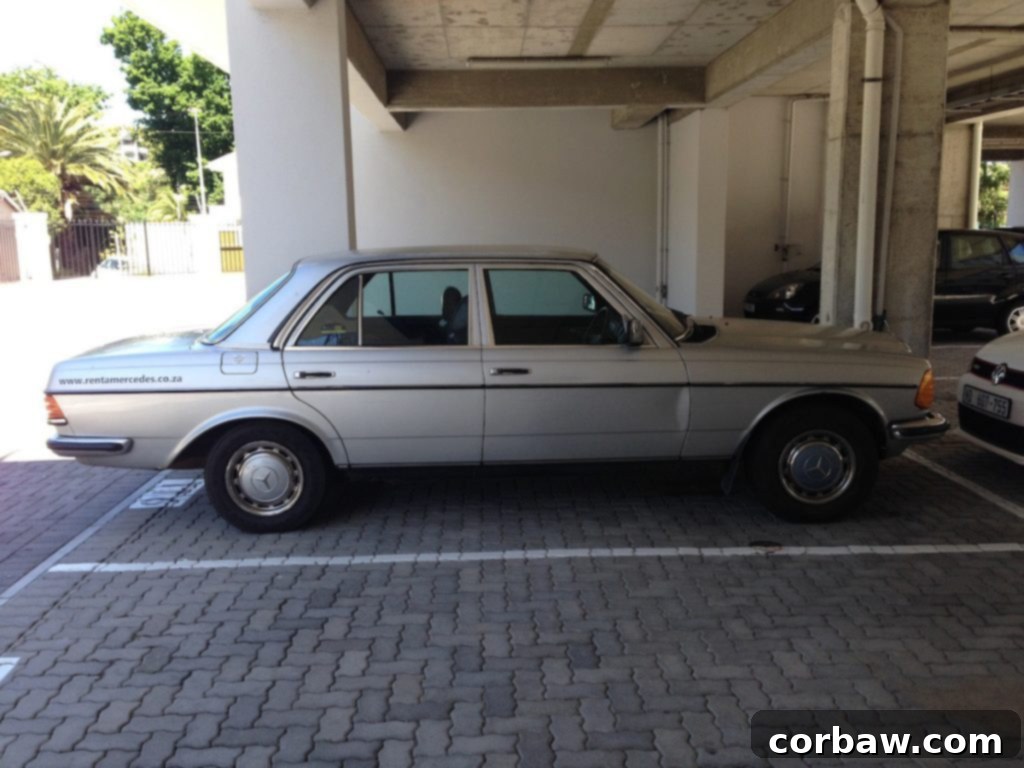 An older model Mercedes rental car used for daily commutes in Rondebosch.