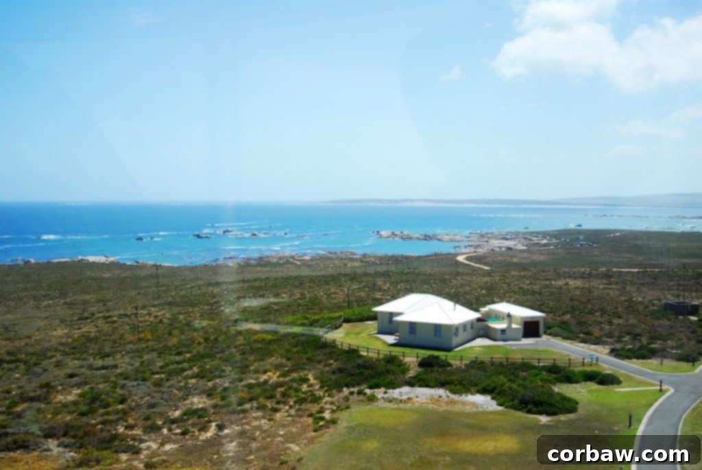Close-up of the lighthouse structure with the ocean in the background, South Africa