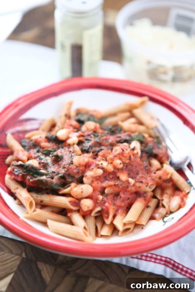 Rustic Swiss Chard and White Bean Pasta 2 Hearty Swiss Chard with White Beans and Tomato Sauce over Whole Wheat Pasta - a healthy vegetarian meal from Aggie's Kitchen
