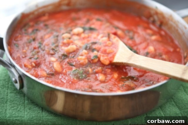 Rustic Swiss Chard and White Bean Pasta 5 Easy Weeknight Dinner: Swiss Chard, White Beans, and Tomato Sauce over Whole Wheat Pasta - a family favorite